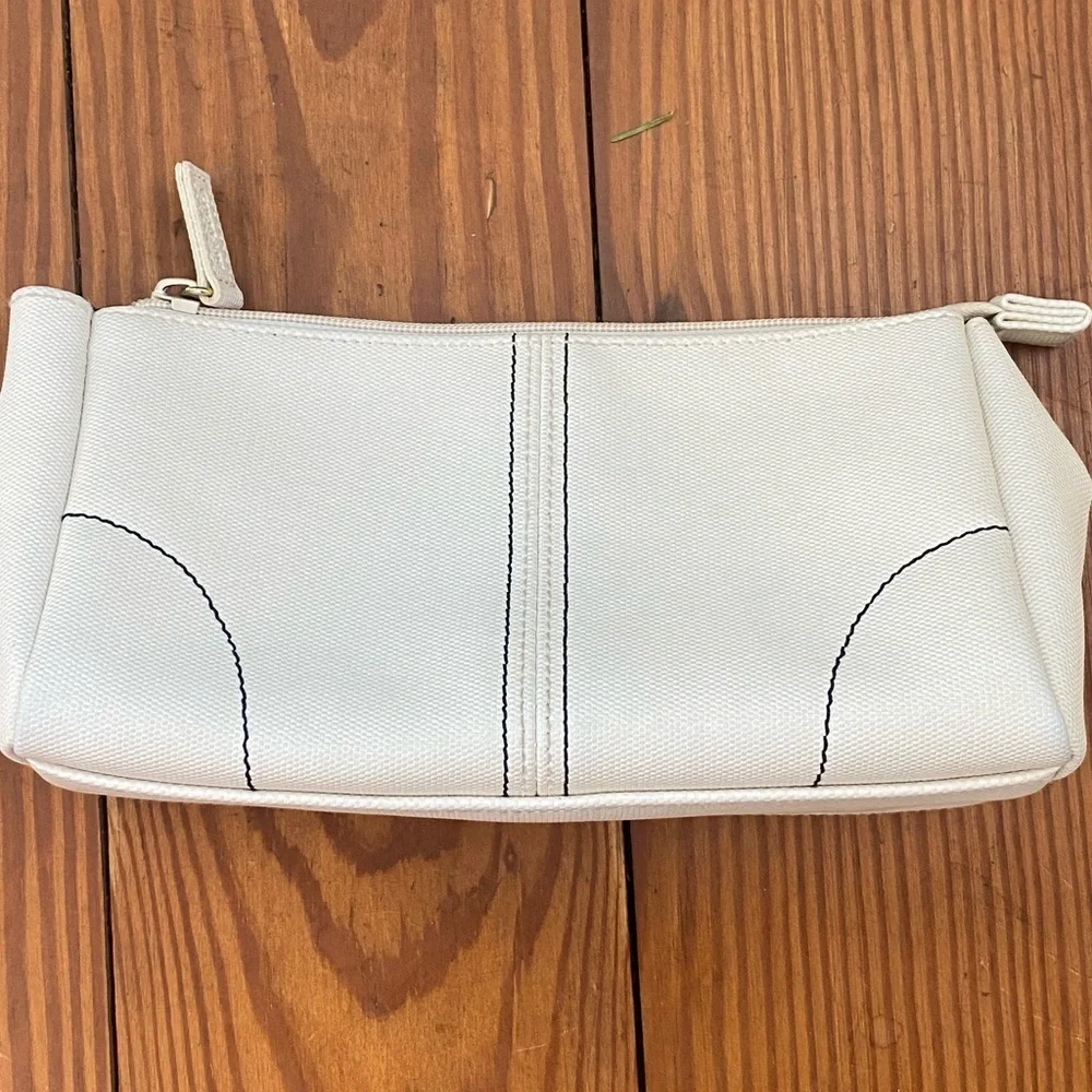 GUERLAIN Elegant Cream Cosmetic Bag with Blue Accents